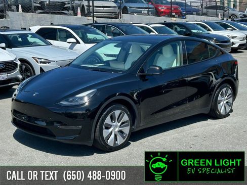 Used 2024 Tesla Model Y Long Range AWD/4WD image 1