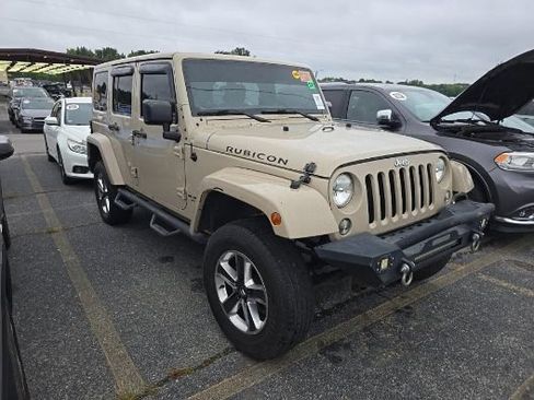 Used 2016 Jeep Wrangler Unlimited Rubicon w/ Dual Top Group AWD/4WD image 1