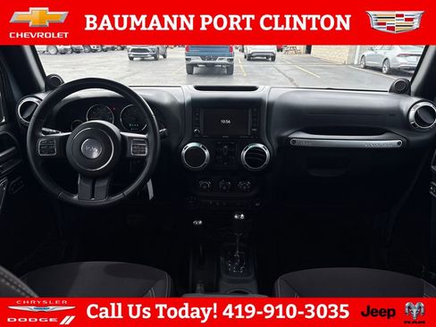 Used 2014 Jeep Wrangler Unlimited Sahara w/ Dual Top Group AWD/4WD image 13