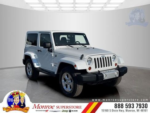 Used 2013 Jeep Wrangler Sahara AWD/4WD image 1