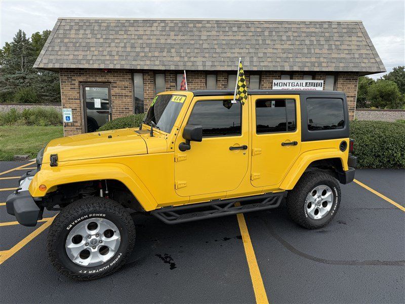 Used 2015 Jeep Wrangler Unlimited Sahara w/ Max Tow Package AWD/4WD image 1