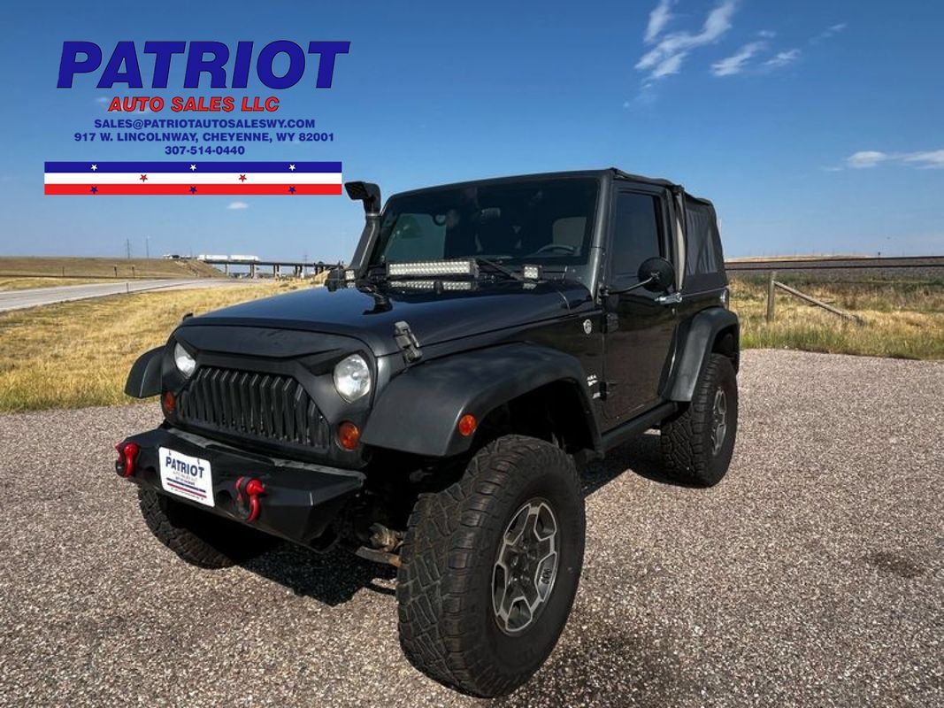 Used 2010 Jeep Wrangler Sahara w/ Dual Top Group AWD/4WD image 1