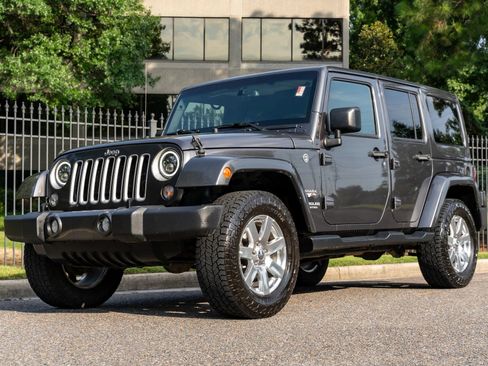Used 2016 Jeep Wrangler Unlimited Sahara AWD/4WD image 1