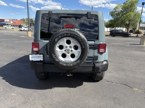 Used 2014 Jeep Wrangler Unlimited Sahara w/ Max Tow Package AWD/4WD image 7