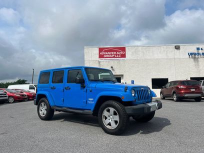 Used 2012 Jeep Wrangler Unlimited Sahara w/ Dual Top Group