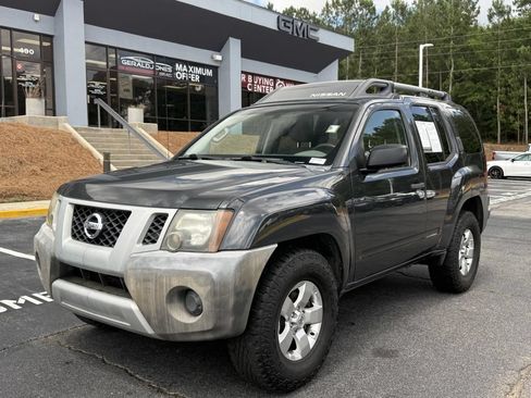 Used 2013 Nissan Xterra X AWD/4WD image 1