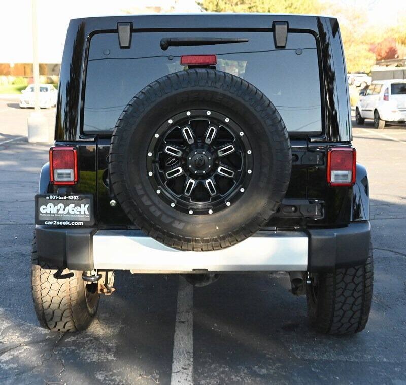 Used 2015 Jeep Wrangler Unlimited Sahara w/ Dual Top Group AWD/4WD image 10