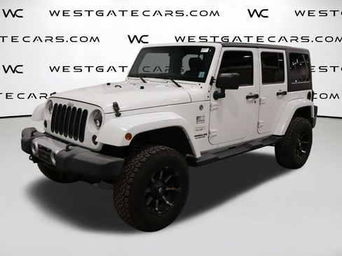 Used 2012 Jeep Wrangler Unlimited Sahara w/ Max Tow Pkg AWD/4WD image 1
