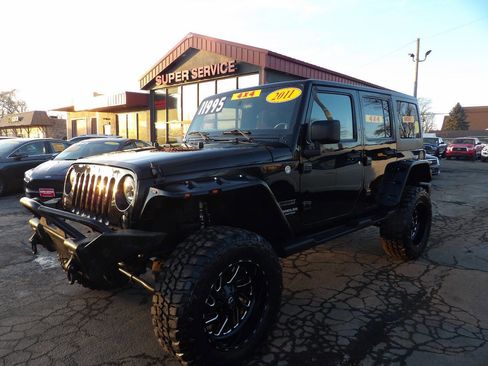Used 2011 Jeep Wrangler Unlimited Sport image 1
