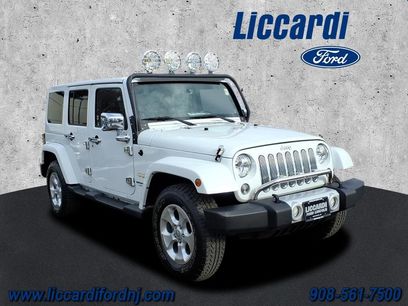 Used 2014 Jeep Wrangler Unlimited Sahara w/ Dual Top Group