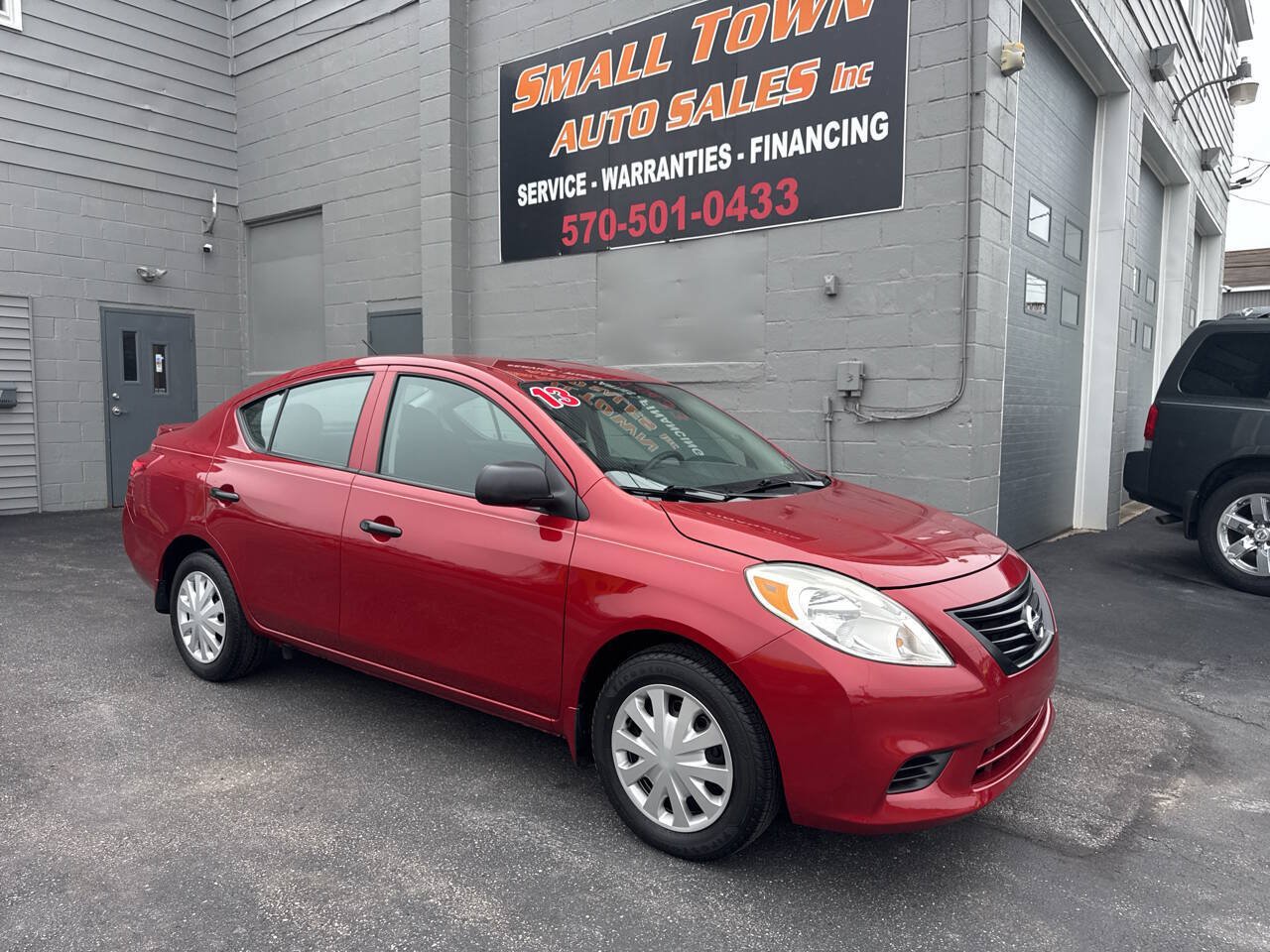 Used 2013 Nissan Versa S Plus FWD image 1