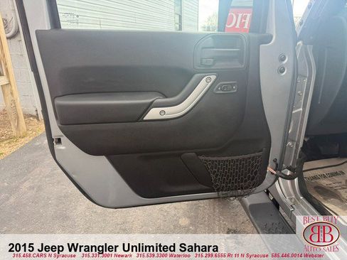 Used 2015 Jeep Wrangler Unlimited Sahara w/ Dual Top Group AWD/4WD image 9