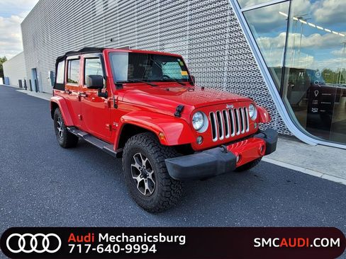 Used 2016 Jeep Wrangler Unlimited Sahara w/ Dual Top Group AWD/4WD image 1