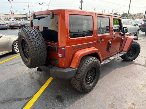 Used 2014 Jeep Wrangler Unlimited Sahara w/ Dual Top Group AWD/4WD image 43
