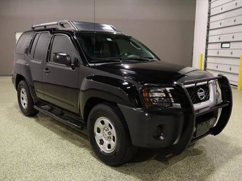Used 2012 Nissan Xterra X image 1
