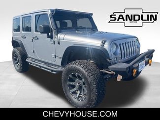 Used 2014 Jeep Wrangler Unlimited Sahara w/ Max Tow Package video 1