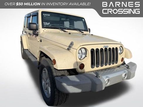 Used 2011 Jeep Wrangler Unlimited Sahara w/ Dual Top Group AWD/4WD image 1