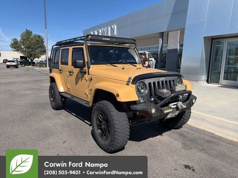Used 2014 Jeep Wrangler Unlimited Sport AWD/4WD image 1