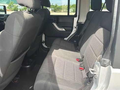 Used 2012 Jeep Wrangler Unlimited Sahara w/ Dual Top Group AWD/4WD image 17