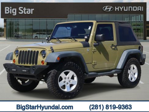 Used 2013 Jeep Wrangler Sport image 1