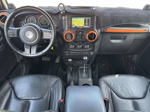 Used 2013 Jeep Wrangler Unlimited Sahara w/ Dual Top Group AWD/4WD image 2