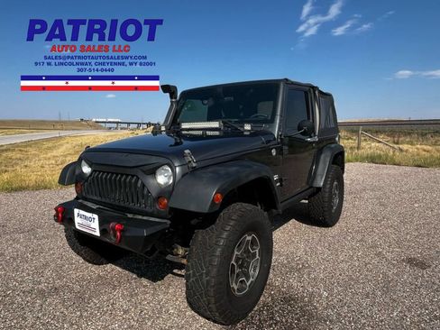 Used 2010 Jeep Wrangler Sahara w/ Dual Top Group AWD/4WD image 1