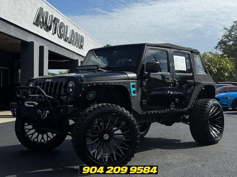 Used 2016 Jeep Wrangler Unlimited Sport w/ Max Tow Package AWD/4WD image 1