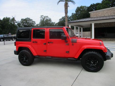 Used 2013 Jeep Wrangler Unlimited Sahara w/ Trailer Tow Group AWD/4WD image 1