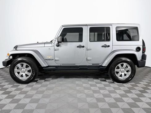 Used 2013 Jeep Wrangler Unlimited Sahara w/ Dual Top Group AWD/4WD image 7