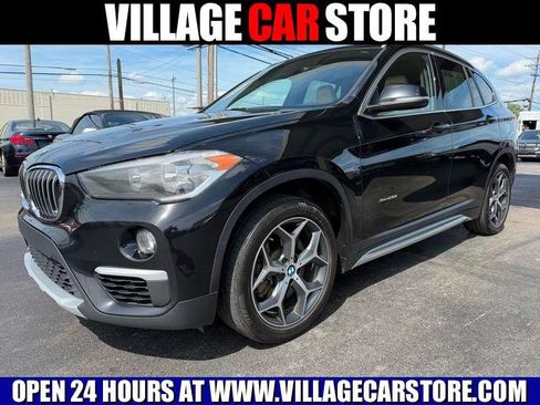 Used 2018 BMW X1 xDrive28i AWD/4WD image 1