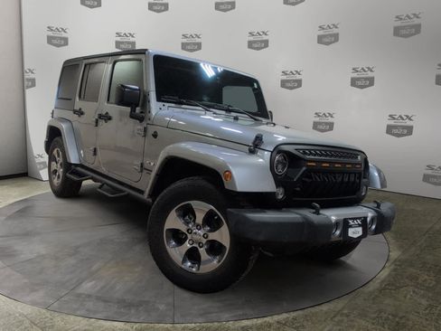 Used 2016 Jeep Wrangler Unlimited Sahara image 1