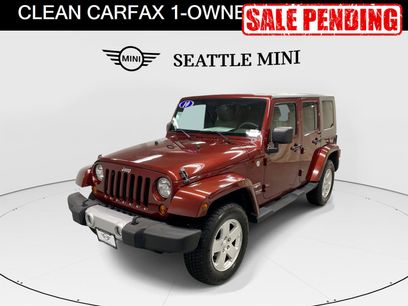 Used 2010 Jeep Wrangler Unlimited Sahara w/ Dual Top Group