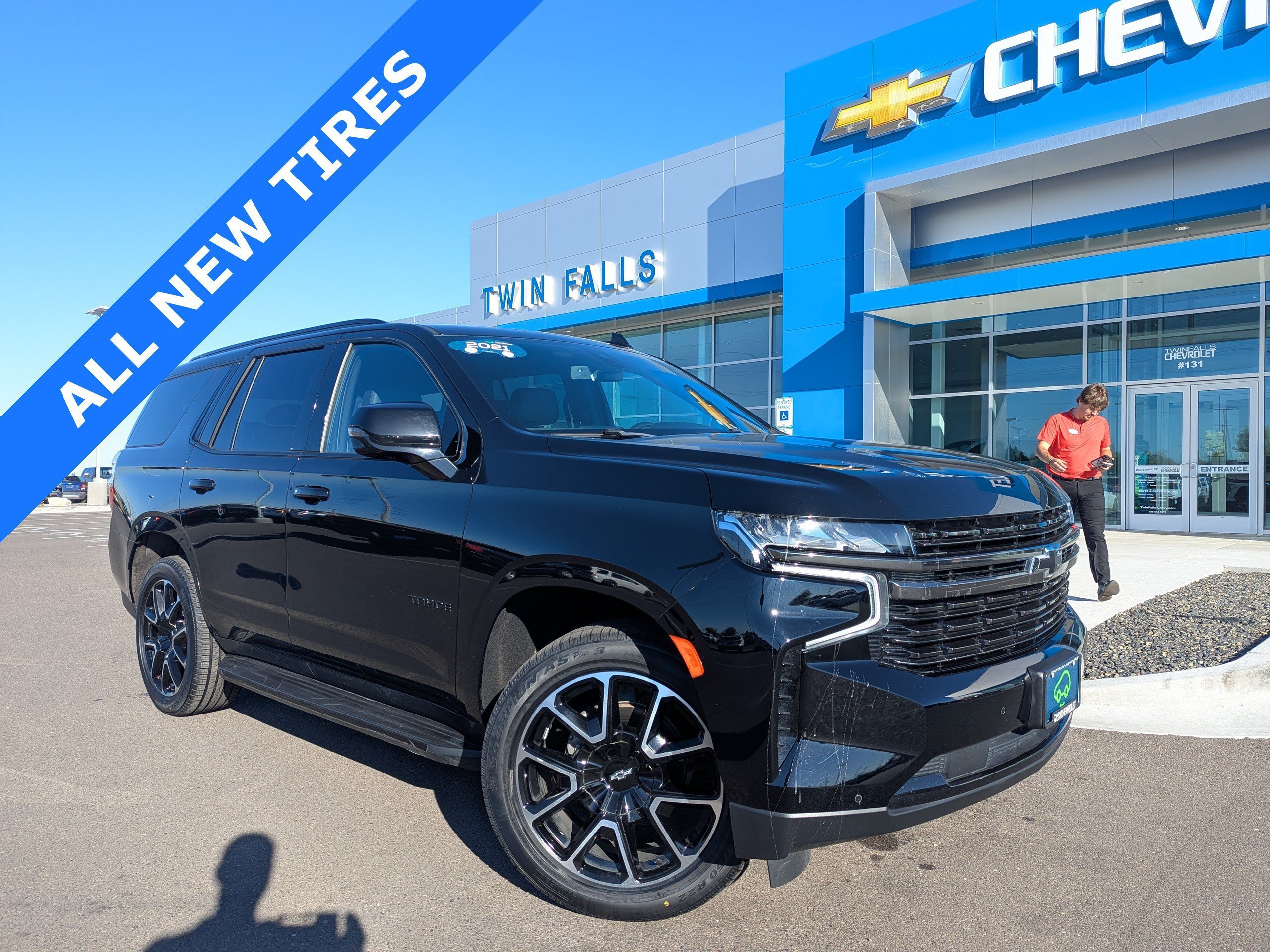 Certified 2021 Chevrolet Tahoe RST w/ Luxury Package AWD/4WD image 1