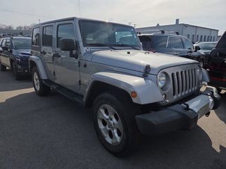Used 2015 Jeep Wrangler Unlimited Sahara w/ Dual Top Group video 1