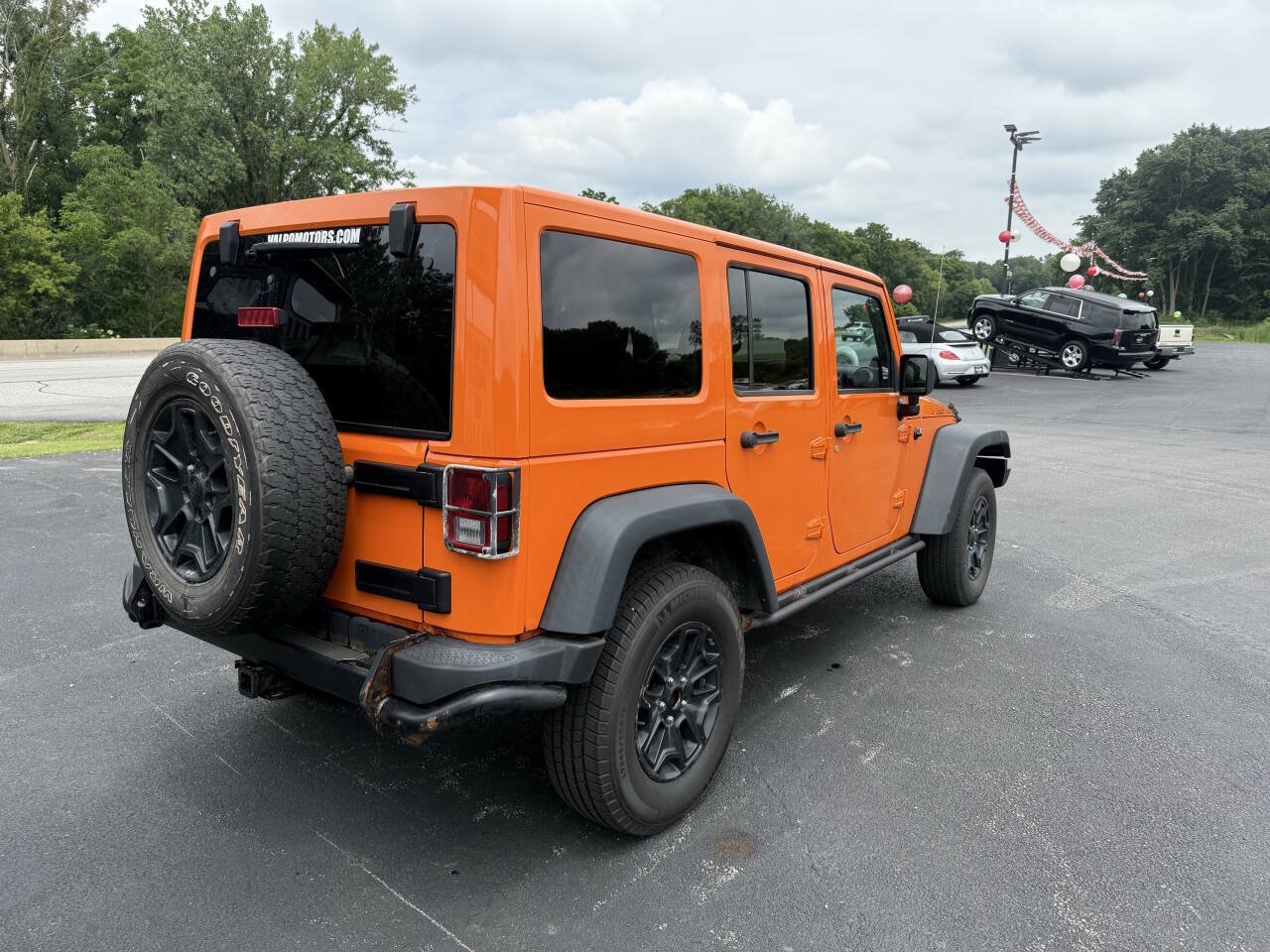 Used 2013 Jeep Wrangler Unlimited Sahara w/ Dual Top Group AWD/4WD image 9