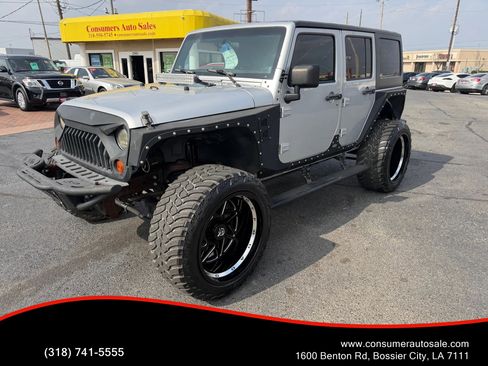 Used 2012 Jeep Wrangler Unlimited Sport image 1