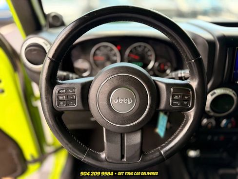 Used 2013 Jeep Wrangler Unlimited Sahara w/ Dual Top Group AWD/4WD image 11