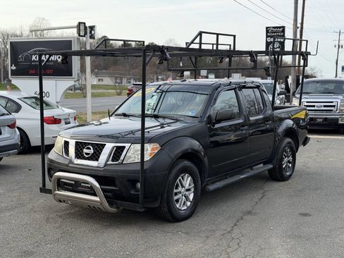 Used 2014 Nissan Frontier SV w/ SV Value Truck Package AWD/4WD image 1