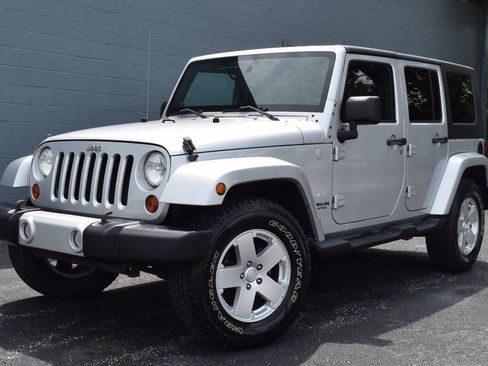 Used 2010 Jeep Wrangler Unlimited Sahara w/ Trailer Tow Group AWD/4WD image 1