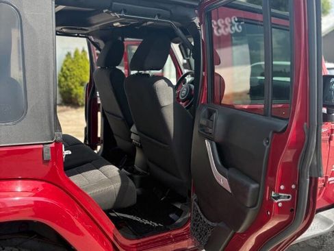 Used 2012 Jeep Wrangler Unlimited Sahara w/ Dual Top Group AWD/4WD image 12
