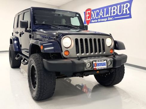 Used 2013 Jeep Wrangler Unlimited Sport AWD/4WD image 2