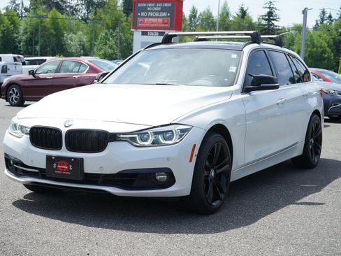 Used 2017 BMW 330i xDrive Wagon AWD/4WD image 1