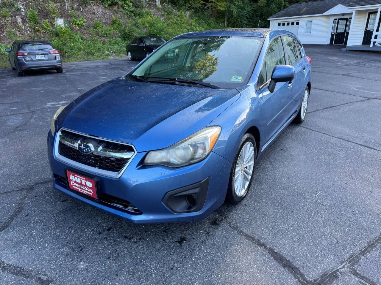 Used 2014 Subaru Impreza 2.0i Premium AWD/4WD image 1