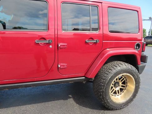 Used 2013 Jeep Wrangler Unlimited Rubicon w/ Dual Top Group AWD/4WD image 16