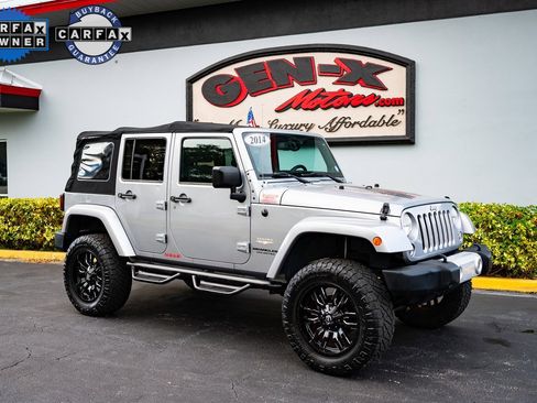 Used 2014 Jeep Wrangler Unlimited Sahara w/ Connectivity Group image 1