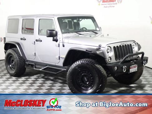 Used 2014 Jeep Wrangler Unlimited Sahara w/ Max Tow Package AWD/4WD image 1