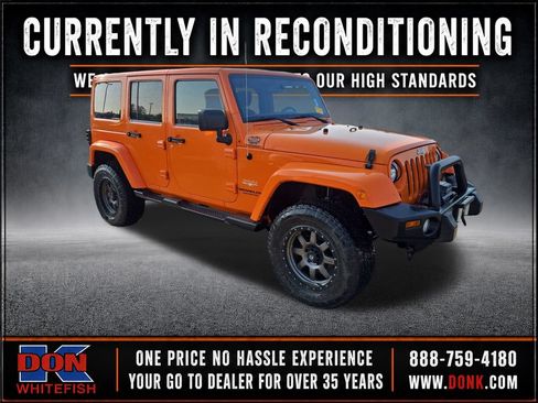 Used 2013 Jeep Wrangler Unlimited Sahara w/ Connectivity Group AWD/4WD image 1