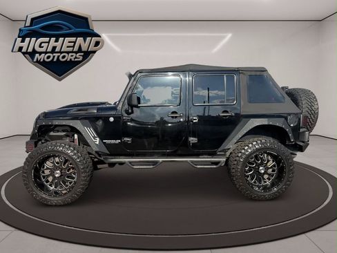 Used 2014 Jeep Wrangler Unlimited Rubicon w/ Dual Top Group AWD/4WD image 3