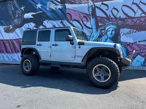 Used 2012 Jeep Wrangler Unlimited Sahara w/ Connectivity Group image 1