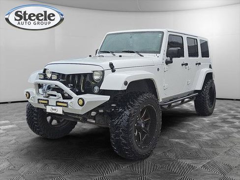 Certified 2016 Jeep Wrangler Unlimited Sahara w/ Dual Top Group AWD/4WD image 1
